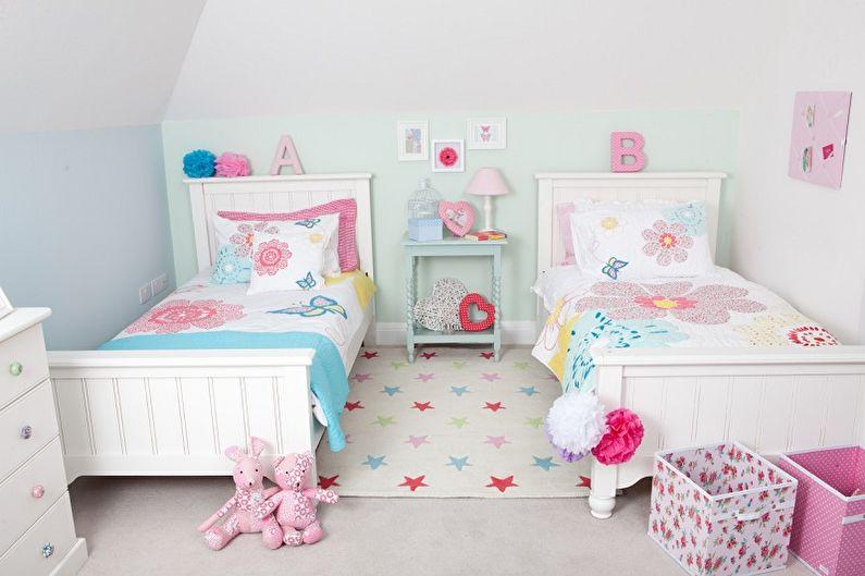 Дизайн интерьера детской комнаты для двух девочек - фото
