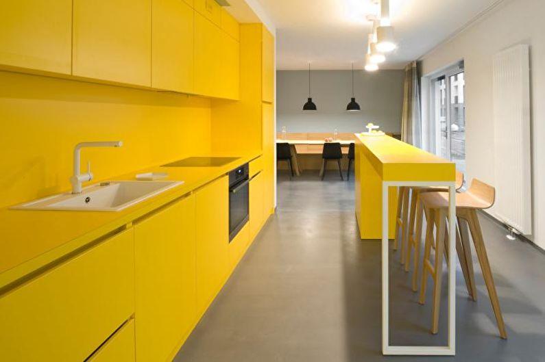 Дизайн интерьера кухни в желтом цвете - фото