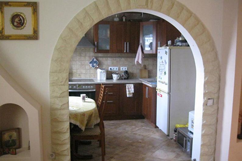 Арки и дверные проемы из камня на кухне - фото